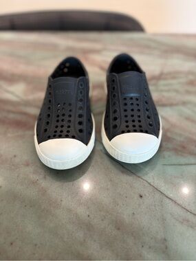 Native Shoes Kids Slip-On Sneakers in Black and White